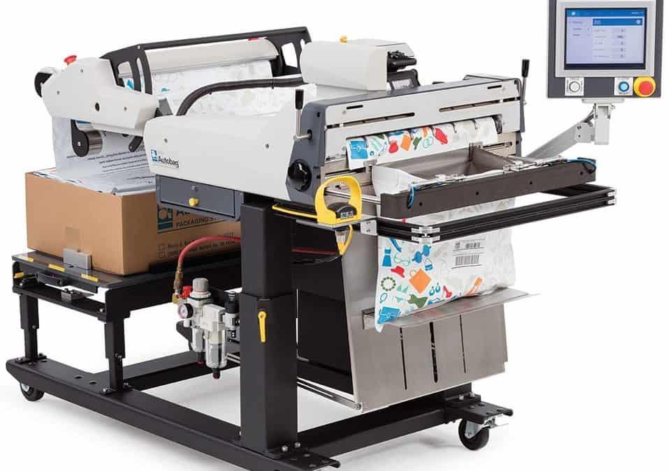 Automated mail packaging machine